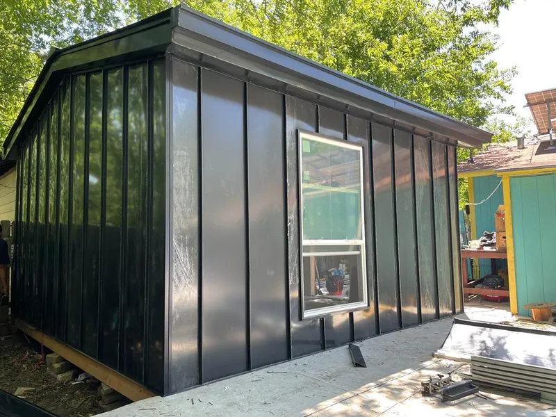 Black standing seam metal wall panels for Roof Inspection in Wahoo