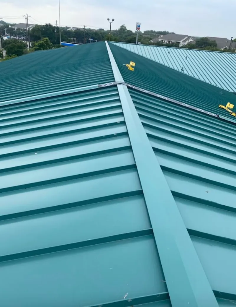 Green commercial metal roof ridge and valley for Metal Roof Repair in Wahoo